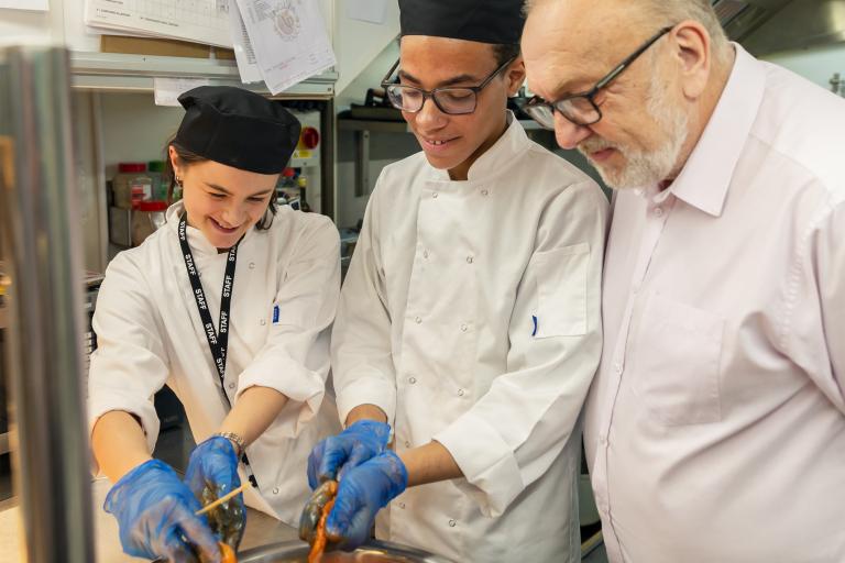 Cllr Tony Ball and apprentices at Colchester Mercury Theatre