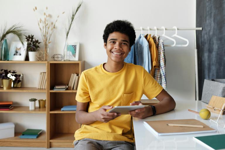 Young person holding an ipad